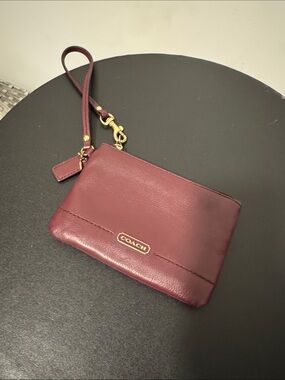 COACH Wine Leather Wristlet with Gold Hardware